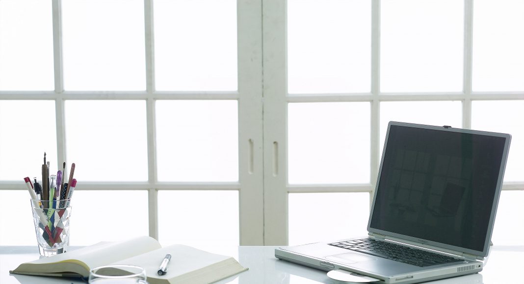 9569836_MotionElements_view-of-laptop-and-book